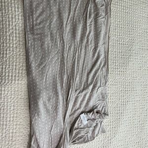 Solly x AJJ taupe cross baby carrier